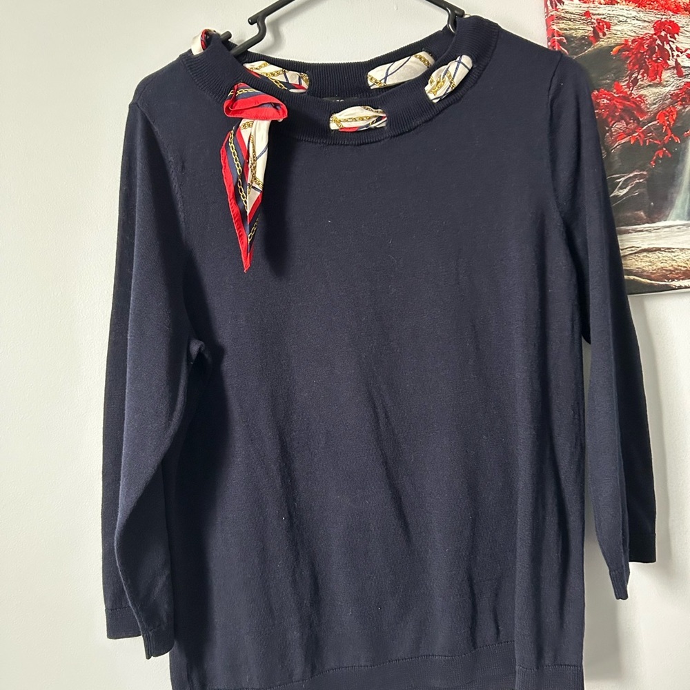 Navy Sweater with Red Scarf Accent